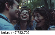 A diverse group of individuals are seen laughing and sharing a moment of joy together, with big smiles on their faces. Стоковое AI-изображение, AI-художник Данила Большаков / Фотобанк Лори