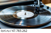 Record player with a vinyl record in front of it, ready to play music. Стоковое AI-изображение, AI-художник Данила Большаков / Фотобанк Лори