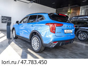 Автомобиль Haval Jolion внутри в официальном дилерском центре. Китайский производитель автомобилей. Редакционное фото, фотограф FotograFF / Фотобанк Лори