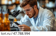 A scientist in protective eyewear studies samples under a microscope, comparing findings with information on a smartphone in a research laboratory. Стоковое AI-изображение, AI-художник Данила Большаков / Фотобанк Лори