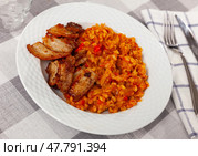 Barley with cabbage served with fried brisket. Стоковое фото, фотограф Яков Филимонов / Фотобанк Лори