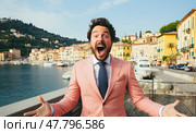 The Daring Visionary: A Confident Man Dons a Bright Pink Suit and a Stylish Blue Tie, Defying Convention. Стоковое AI-изображение, AI-художник Данила Большаков / Фотобанк Лори