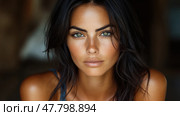 This close-up captures a woman with radiant green eyes and bronzed skin, highlighting her natural beauty in soft, warm light. Стоковое AI-изображение, AI-художник Данила Большаков / Фотобанк Лори