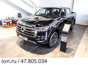 Автомобиль Haval GWM Poer внутри в официальном дилерском центре. Китайский производитель автомобилей. Редакционное фото, фотограф FotograFF / Фотобанк Лори