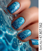 Unique nail art featuring water-inspired design in vibrant blue tones. Уникальный нейл-арт с водным дизайном в ярких синих тонах. Стоковое AI-изображение, AI-художник Katsiaryna Repich / Фотобанк Лори