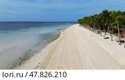 Aerial view of beautiful tropical sandy beach. Стоковое фото, фотограф Михаил Коханчиков / Фотобанк Лори