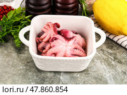 Marinated baby octopus snack appetizer. Стоковое фото, фотограф Андрей Старостин / Фотобанк Лори