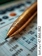 A golden pen lies on a lottery ticket filled with numbers and grids, symbolizing hopes and excitement for potential winnings during the draw. Стоковое AI-изображение, AI-художник Данила Большаков / Фотобанк Лори