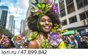 A woman marching in a parade with colorful flowers adorning her head. Стоковое AI-изображение, AI-художник Данила Большаков / Фотобанк Лори