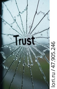 The text "Trust" on the broken glass. Стоковое AI-изображение, AI-художник Sergey Grishin / Фотобанк Лори