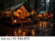 Group of tents is set up in midst of dense forest, surrounded by tall trees and green foliage. Стоковое AI-изображение, AI-художник Данила Большаков / Фотобанк Лори