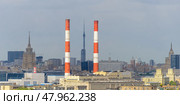 April 26, 2025, Moscow, Russia: View of Moscow from observation deck of Vorobyovy Gory to TEC-12 Moscow Power Plant on Berezhkovskaya Embankment. Редакционное фото, фотограф Алексей Антипов / Фотобанк Лори