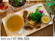 Georgian Khashlama, boiled lamb meat with broth and greens. Стоковое фото, фотограф Яков Филимонов / Фотобанк Лори