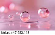 Floating water droplets creating a soft pink atmosphere in a tranquil setting during early morning light. Стоковое AI-изображение, AI-художник Сергей Толмачёв / Фотобанк Лори