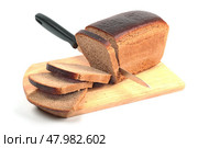 Rye bread on hardboard isolated on white background. Стоковое фото, фотограф Абрамов Михаил / Фотобанк Лори