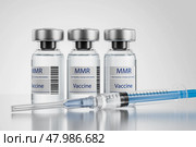MMR campaign. Doctor with a vial of measles, mumps and rubella vaccine doses. Medicine and healthcare concept. Vaccination for revaccination against measles, mumps and rubella. 3d render. Стоковая иллюстрация, иллюстратор Alexander / Фотобанк Лори