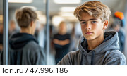 A young teen with light brown hair is posed confidently in a contemporary environment, surrounded by reflections and people in the background. Стоковое AI-изображение, AI-художник Данила Большаков / Фотобанк Лори