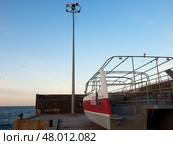 Pleasure boat in storage (2021 год). Редакционное фото, фотограф Александр Малышев / Фотобанк Лори