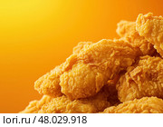 Крупный план хрустящих куриных стрипсов на жёлтом фоне. Стоковое AI-изображение, AI-художник Александр Жуков / Фотобанк Лори