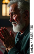 Tearful Elderly Man Praying in a Dim Mosque at Dawn, Evoking Sorrow, Devotion, and the Spirit of Community Support. Стоковое AI-изображение, AI-художник Sergey Grishin / Фотобанк Лори