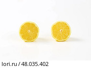 Two fresh lemon halves. Стоковое фото, фотограф Alena Dvorakova / PantherMedia / Фотобанк Лори