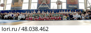 Moscow, Russia, April 24, 2025: Children practice martial arts with a coach in the gym, sambo, judo, aikido. Редакционное фото, фотограф Igor Skripachev / Фотобанк Лори