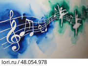 Vibrant watercolor artwork of musical notes and dancers on blue and green background. Стоковое AI-изображение, AI-художник Башкирова Анна / Фотобанк Лори