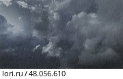 Dark storm clouds and heavy rain. Стоковое видео, видеограф Михаил Коханчиков / Фотобанк Лори