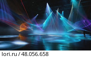 Light show illuminating dark stage with colorful laser beams. Стоковое AI-видео, аниматор Юрий Поздников / Фотобанк Лори