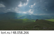Mountain landscape with sun rays. Стоковое видео, видеограф Михаил Коханчиков / Фотобанк Лори
