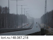 Грузовой транспорт на новой платной дороге М11. Москва - Санкт-Петербург. Редакционное фото, фотограф Дмитрий Неумоин / Фотобанк Лори