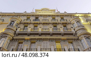Ornate facade of the hermitage hotel in monte carlo, monaco, at dusk. Стоковое фото, фотограф David Kashakhi / Фотобанк Лори