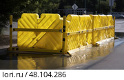 emergency water fill barricade ai generated. Стоковое AI-изображение, AI-художник Vectorwin / Фотобанк Лори