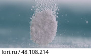 Extreme Close-up effervescent tablet, pill bubbling underwater. Shot on super slow motion camera 1000 fps. Стоковое видео, видеограф Андрей Армягов / Фотобанк Лори