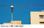 wire hanging cables In the second photograph ai generated. Стоковое AI-изображение, AI-художник Vectorwin / Фотобанк Лори
