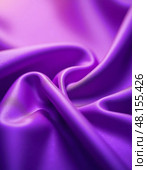 Sinuous folds of deep purple fabric cascade gracefully, creating a rich, tactile landscape that invites touch and appreciation for its soft, luxurious quality Generative AI. Стоковое AI-изображение, AI-художник Юлия Петровская / Фотобанк Лори