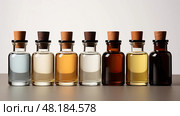organic essential oil bottles ai generated. Стоковое AI-изображение, AI-художник Vectorwin / Фотобанк Лори