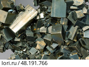 Druse of cubic crystals in golden green tones. The mineral pyrite. Стоковое фото, фотограф EugeneSergeev / Фотобанк Лори