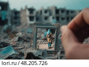 Miniature figure of devastated woman in headscarf and backpacks on city ruins after earthquake or rocket fire from enemy gunfire in frame held by human hand. Стоковое AI-изображение, AI-художник Данила Большаков / Фотобанк Лори