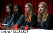 At a conference, four diverse women engage in a panel discussion, expressing their viewpoints and expertise while addressing a captivated audience. Стоковое AI-изображение, AI-художник Данила Большаков / Фотобанк Лори