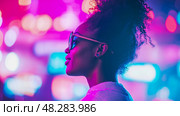 Neon portrait: Profile of a young woman with glasses in vibrant futuristic light. Стоковое AI-изображение, AI-художник Данила Большаков / Фотобанк Лори