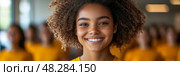 Cheerful young woman portrait with beaming smile, representing optimism and unity, suitable for inclusivity campaign. Стоковое AI-изображение, AI-художник Данила Большаков / Фотобанк Лори