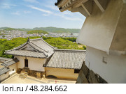 Вид на город из Замка Белой Цапли в Химедзи, Япония. Himeji castle (UNESCO World Heritage), Japan. Стоковое фото, фотограф Римма Тельнова / Фотобанк Лори