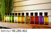 peppermint essential oil bottle ai generated. Стоковое AI-изображение, AI-художник Vectorwin / Фотобанк Лори