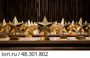polished star gold award. Стоковое AI-изображение, AI-художник Vectorwin / Фотобанк Лори