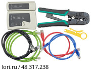 Роутер, кабельный тестер и соединительные кабели. Closeup of network cables connected to router on white. Стоковое фото, фотограф Татьяна Д / Фотобанк Лори