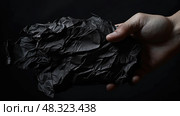 twisted black crinkled paper ai generated. Стоковое AI-изображение, AI-художник Vectorwin / Фотобанк Лори