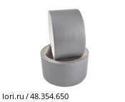 Рулоны серой клейкой ленты на белом фоне. Rolls of Grey Duct Tape with white background. Стоковое фото, фотограф Татьяна Д / Фотобанк Лори