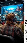 Gaming Immersion: Focused gamer with headset absorbed in action on large monitor. Стоковое AI-изображение, AI-художник Данила Большаков / Фотобанк Лори