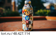 decals metal water bottle ai generated. Стоковое AI-изображение, AI-художник Vectorwin / Фотобанк Лори